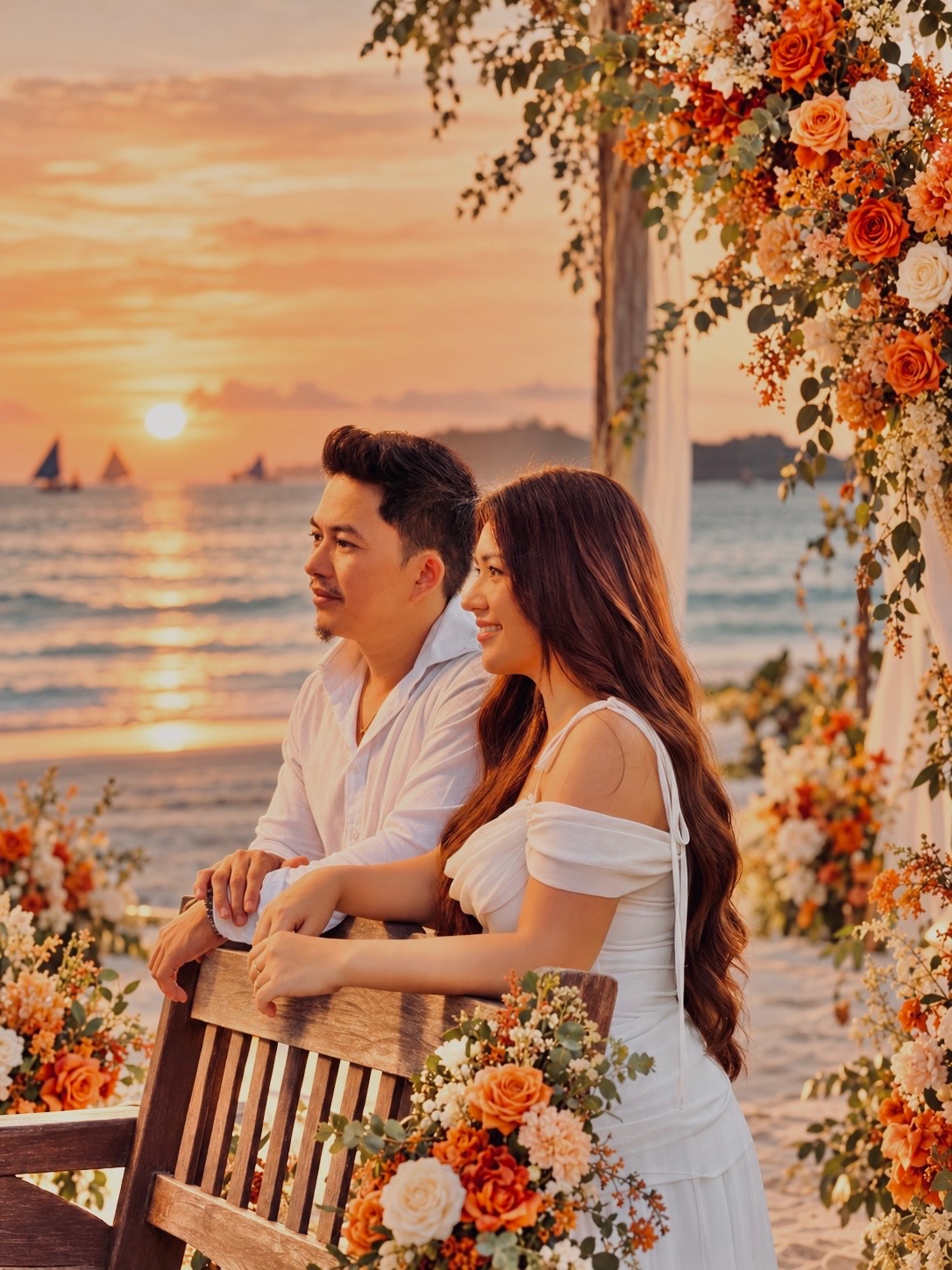 Mark and Lomi at sunset surrounded by flowers