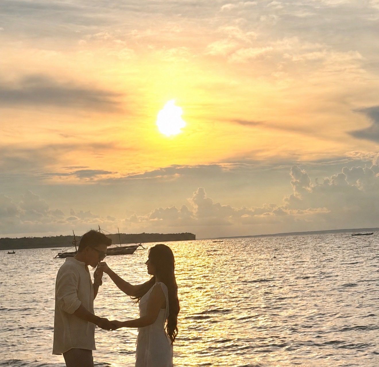 Mark and Lomi sharing a sunset moment